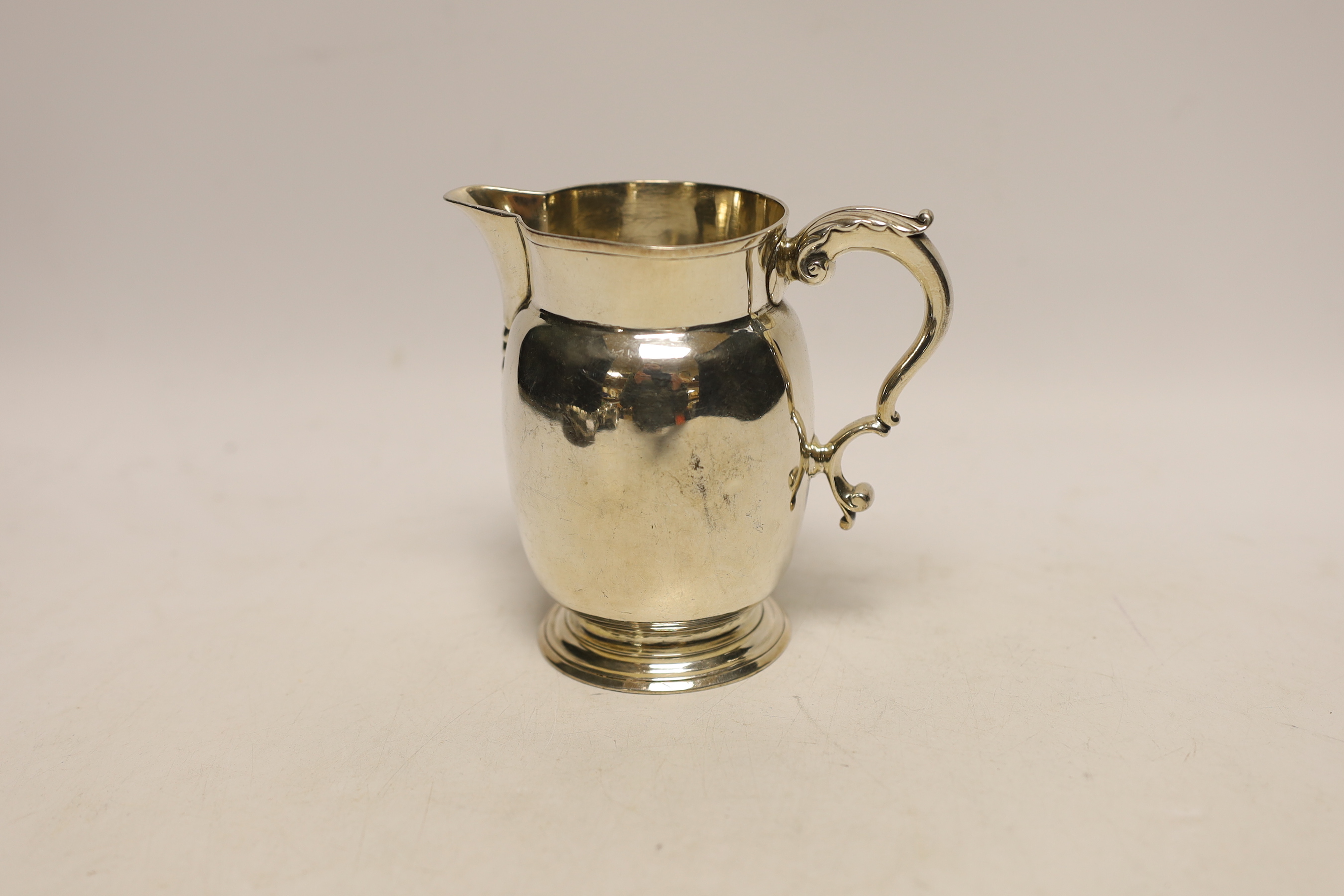 An early George III silver baluster jug, William Skeen, London, 1760, 11.1cm, 7.6oz.